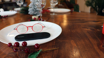 ThinOptics Manhattan Reading Glasses + Milano case on a festively decorated Thanksgiving dinner table