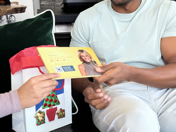 A man receiving a Clarity Kit as a Holiday gift.